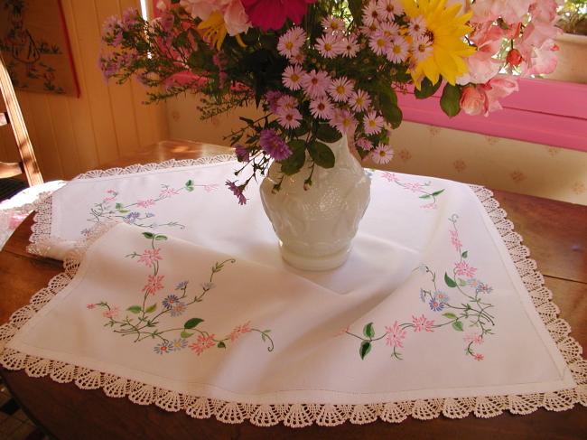 Really romantic tablecloth with hand-embroidered flowers and lace edging