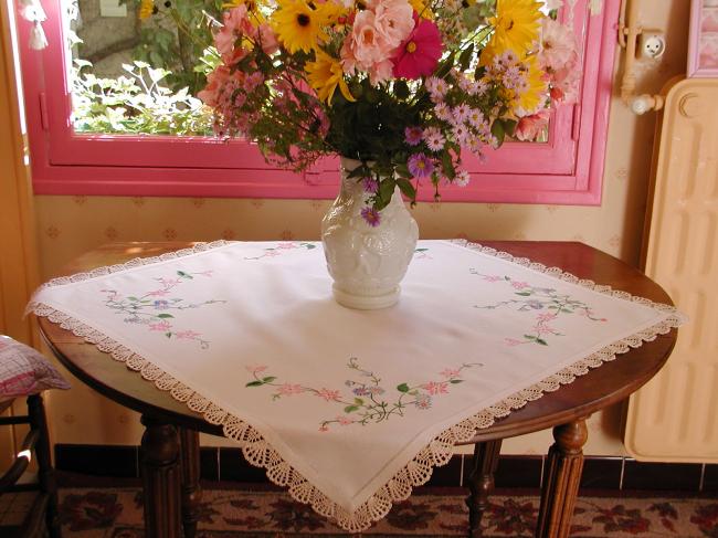 Really romantic tablecloth with hand-embroidered flowers and lace edging