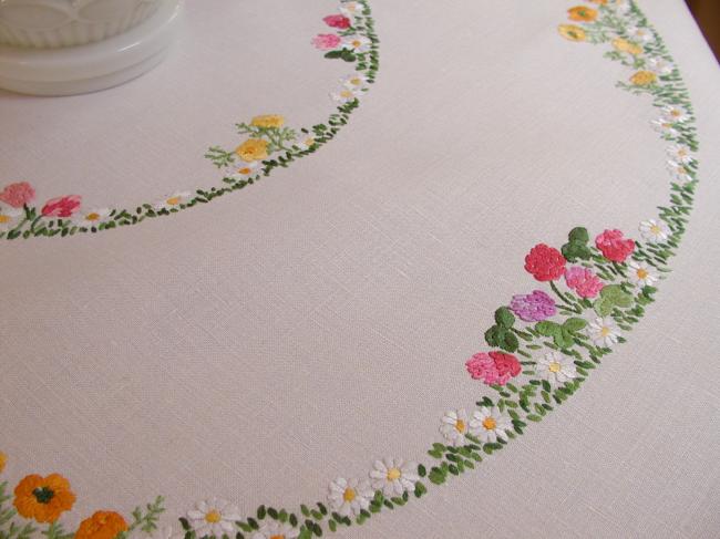 Really romantic tablecloth with hand-embroidered crowns of summer flowers