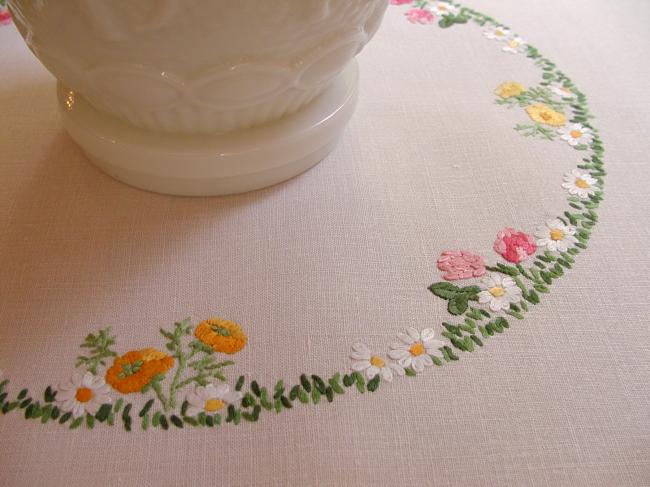 Really romantic tablecloth with hand-embroidered crowns of summer flowers