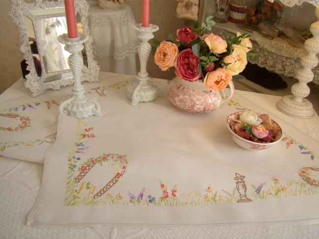 Romantique petite nappe brodée d'un jardin anglais aux couleurs acidulées