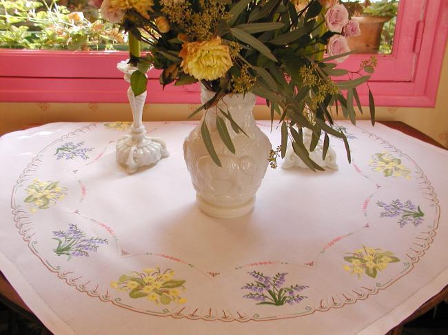 Breathtaking tablecloth with hand-embroidered blue bells and primula