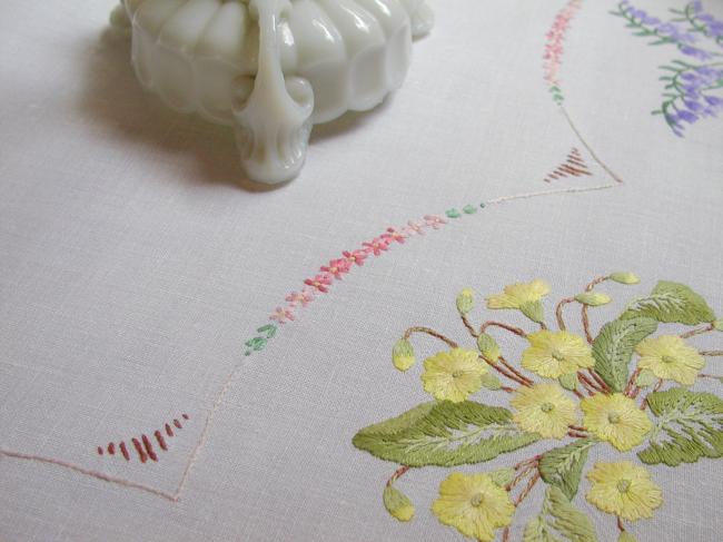 Breathtaking tablecloth with hand-embroidered blue bells and primula