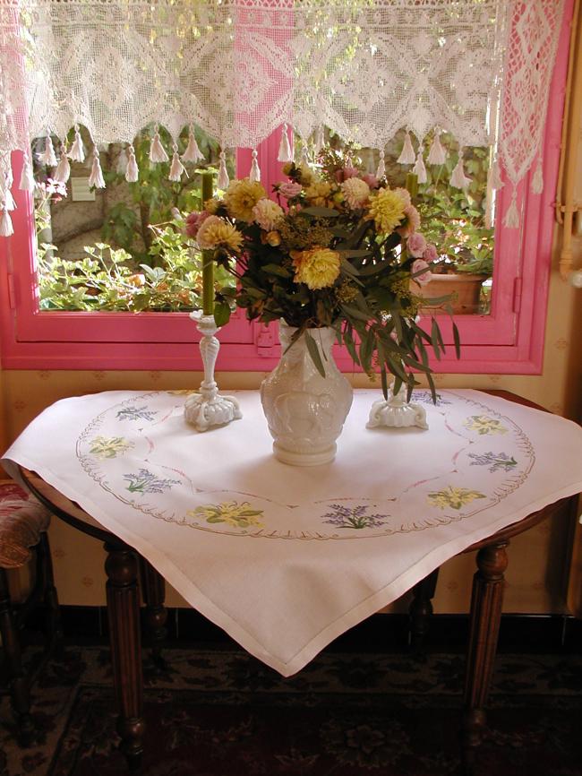 Breathtaking tablecloth with hand-embroidered blue bells and primula