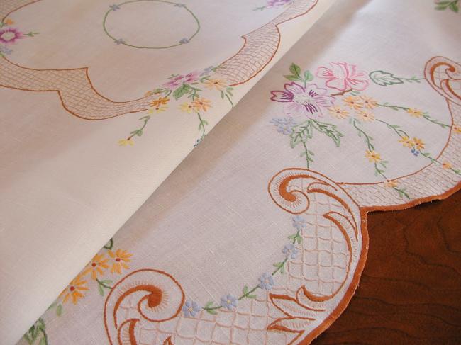 A really romantic tablecloth with charming embroidered flowers