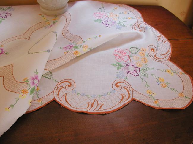 A really romantic tablecloth with charming embroidered flowers