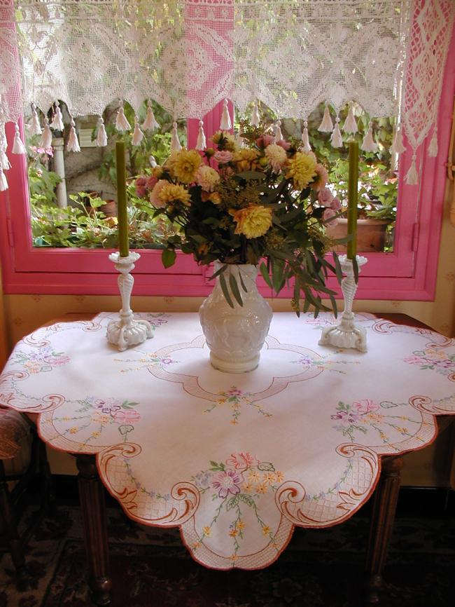 A really romantic tablecloth with charming embroidered flowers