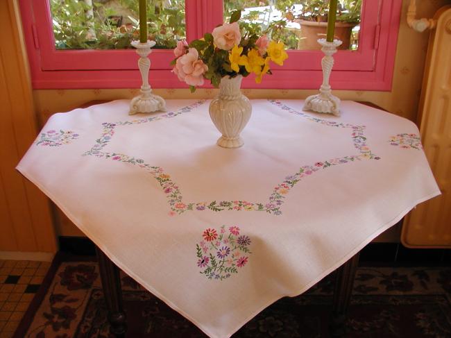 Really romantic tablecloth with hand-embroidered crown of summer flowers