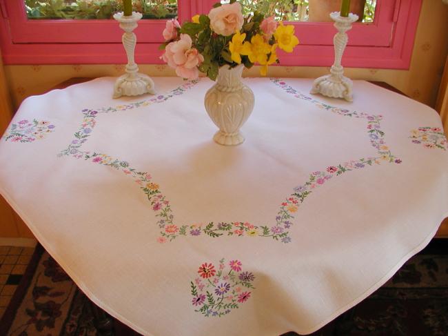 Really romantic tablecloth with hand-embroidered crown of summer flowers