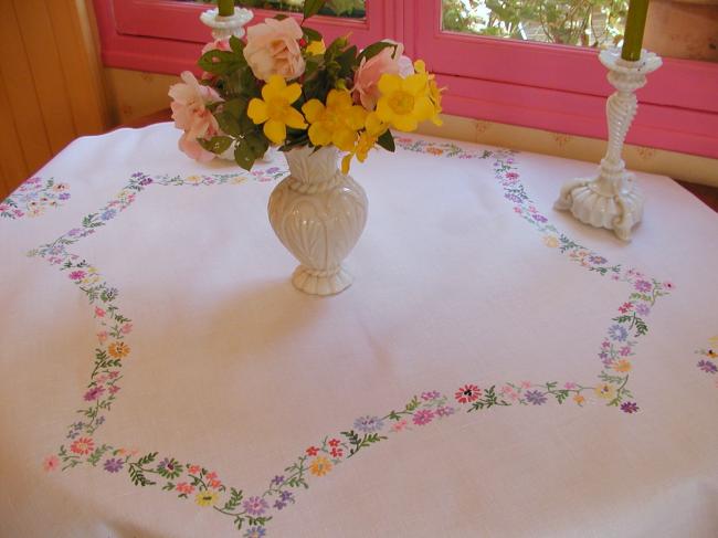 Really romantic tablecloth with hand-embroidered crown of summer flowers