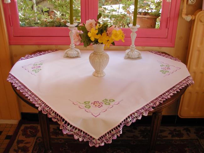 Really adorable tablecloth with hand-embroidered violets and mauve crochet lace