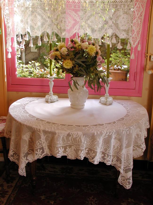 Striking tablecloth with huge crochet lace representing life of forest 1900