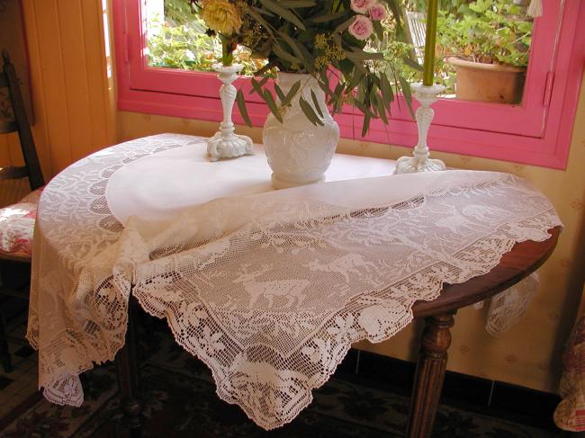 Striking tablecloth with huge crochet lace representing life of forest 1900