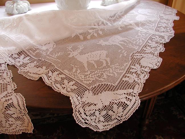 Striking tablecloth with huge crochet lace representing life of forest 1900