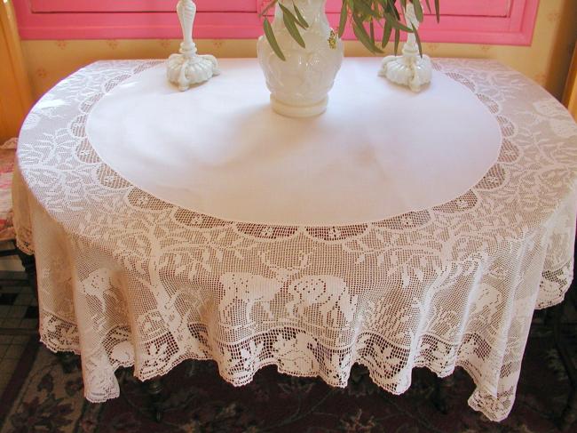 Striking tablecloth with huge crochet lace representing life of forest 1900