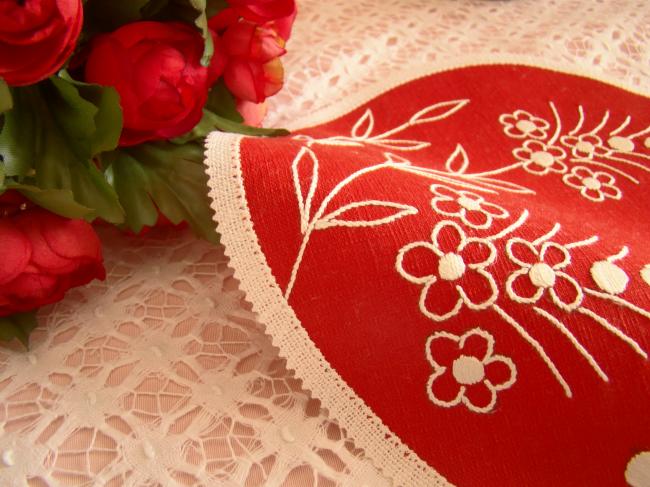 2 lovely red round doilies with hand-embroired flowers.