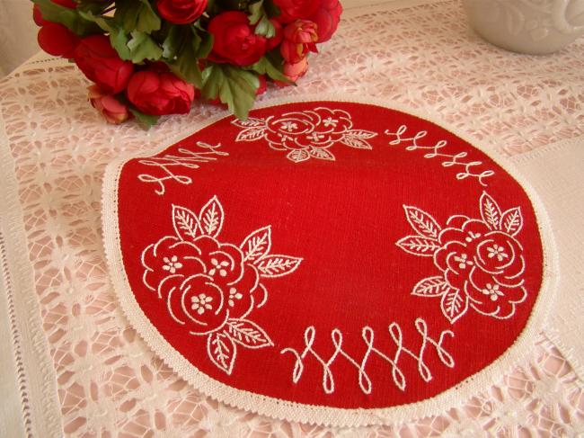 2 lovely red round doilies with hand-embroired flowers.