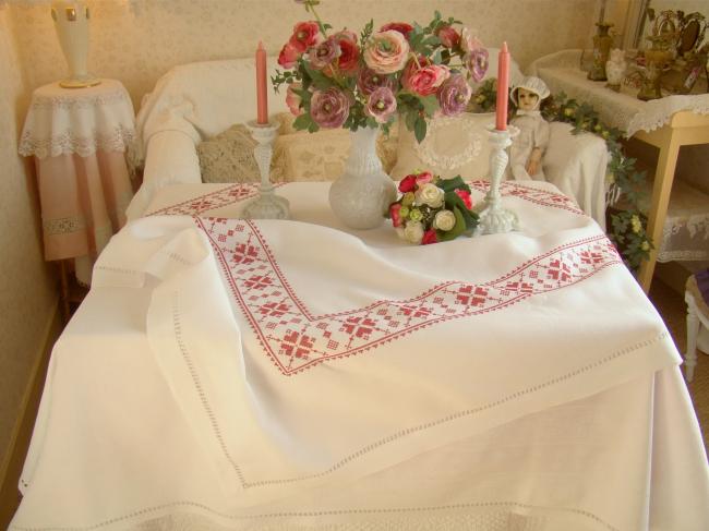 Stunning white linen tablecloth with hand-embroidered cross stitch border