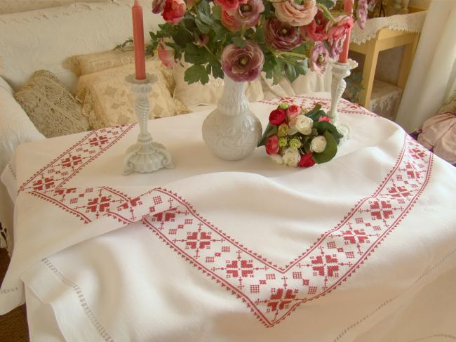 Stunning white linen tablecloth with hand-embroidered cross stitch border