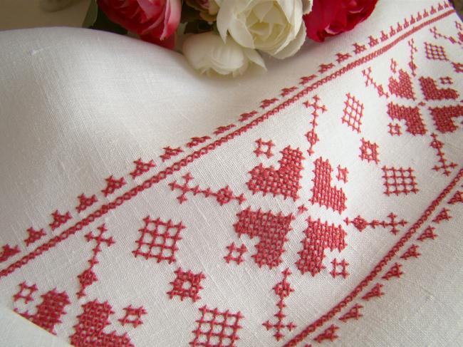 Stunning white linen tablecloth with hand-embroidered cross stitch border