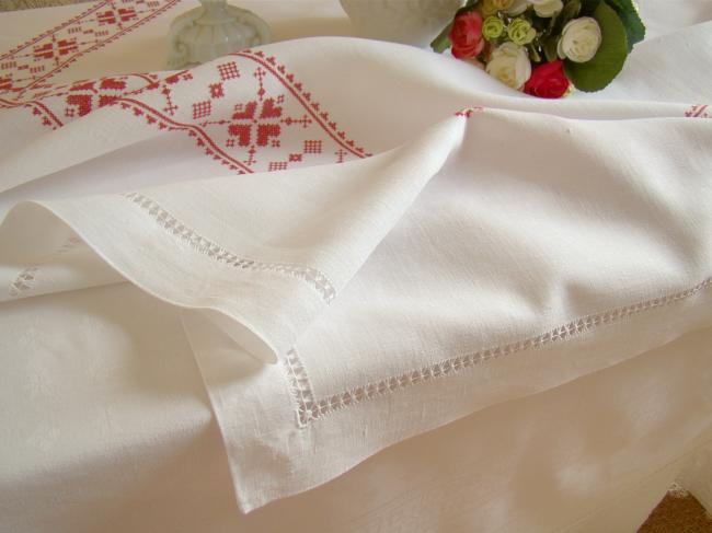 Stunning white linen tablecloth with hand-embroidered cross stitch border