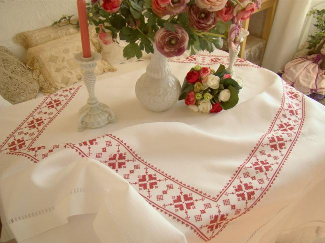 Stunning white linen tablecloth with hand-embroidered cross stitch border