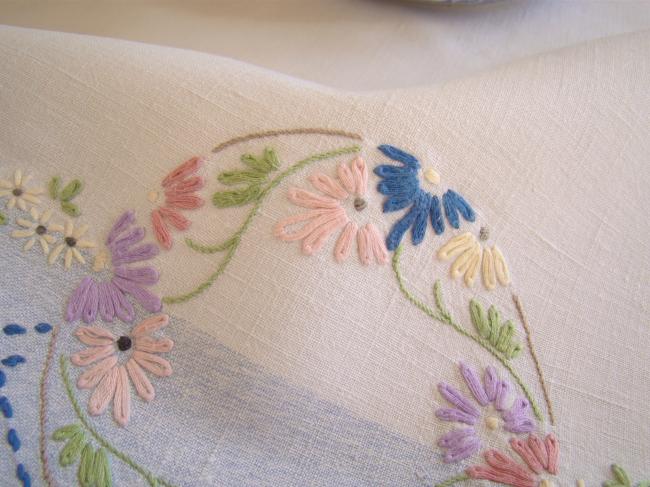 Sweet  white and blue linen tablecloth with hand-embroidered flowers border