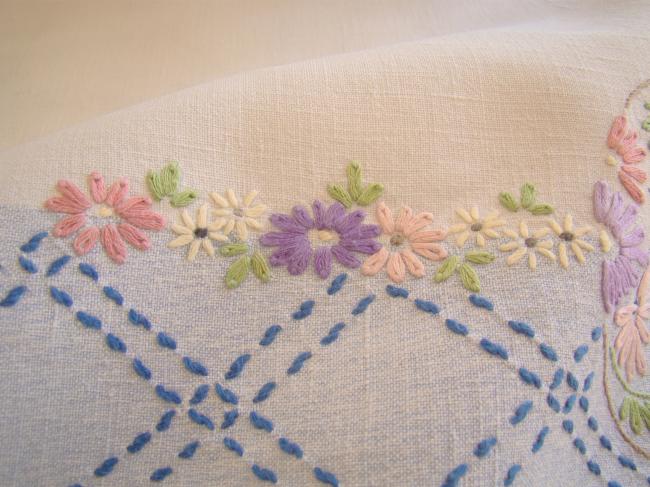 Sweet  white and blue linen tablecloth with hand-embroidered flowers border