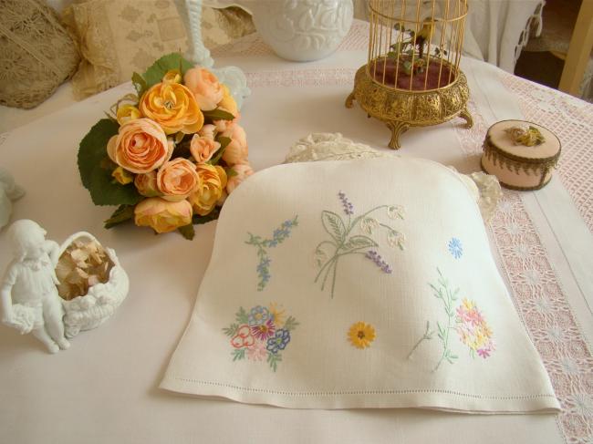 Lovely tea cosy with hand- embroidered flowers