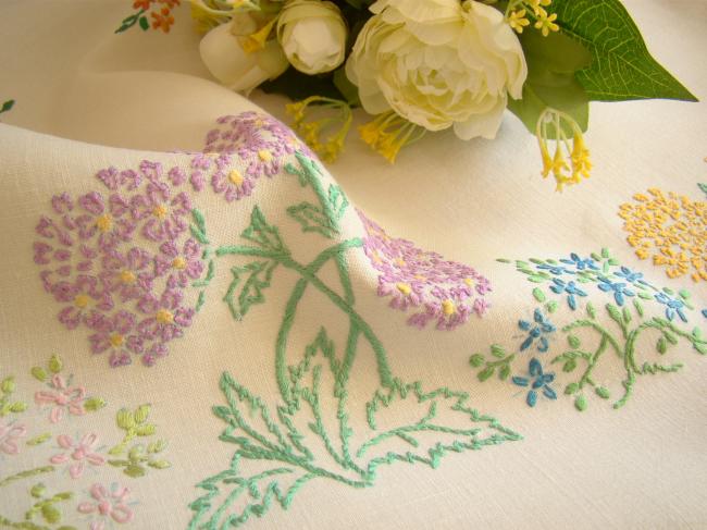 Enchanting small tablecloth with hand-embroidered flowers hydrangea