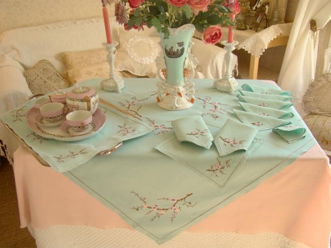 Breathtaking tablecloth and napkins with hand-embroidered blooming appletree