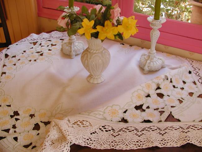 Charming tablecloth in linen with rich embroidered vases of flowers