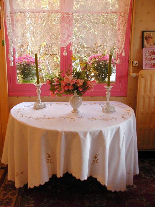 Really stunning tablecloth with hand-embroidered spread of flowers