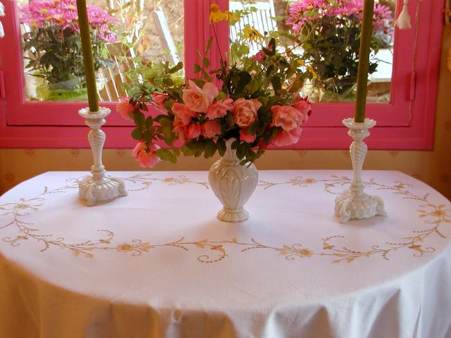 Really stunning tablecloth with hand-embroidered spread of flowers