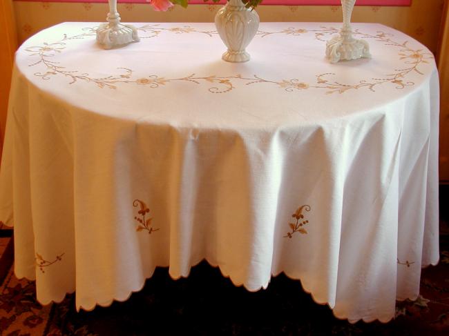 Really stunning tablecloth with hand-embroidered spread of flowers