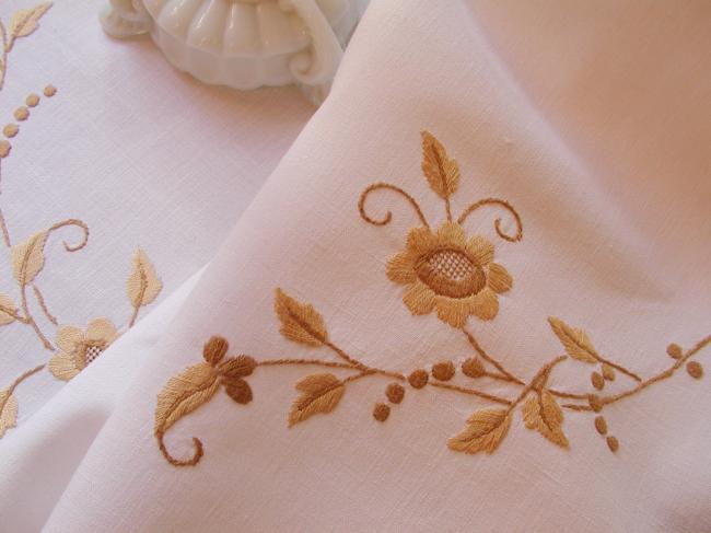 Really stunning tablecloth with hand-embroidered spread of flowers