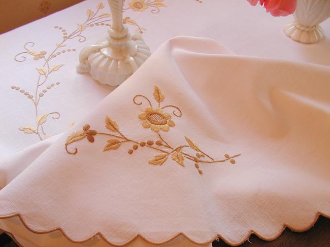 Really stunning tablecloth with hand-embroidered spread of flowers