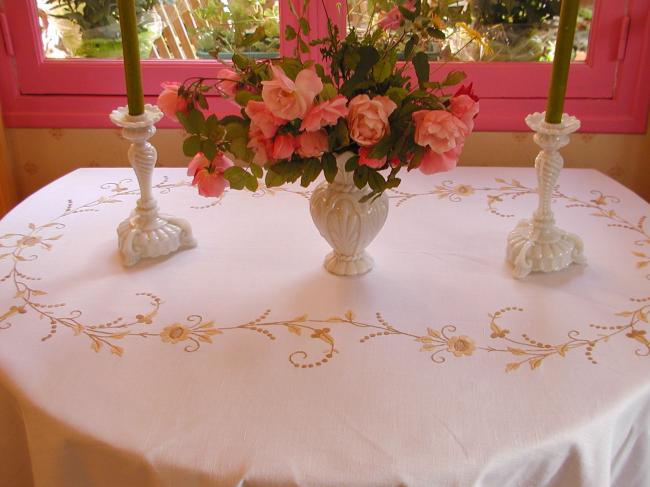 Really stunning tablecloth with hand-embroidered spread of flowers