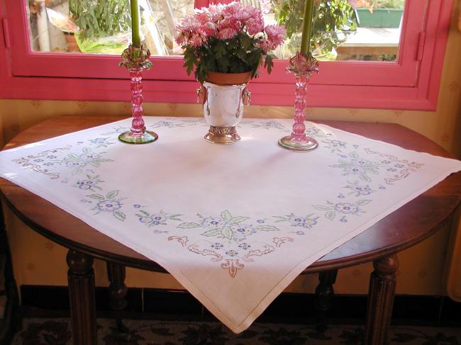 Really beautiful tablecloth with hand-embroidered blue flowers