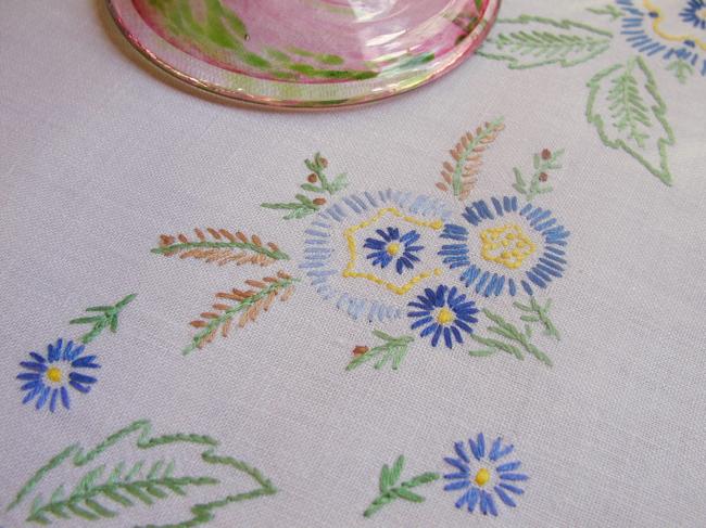 Really beautiful tablecloth with hand-embroidered blue flowers