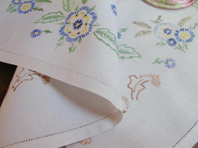 Really beautiful tablecloth with hand-embroidered blue flowers