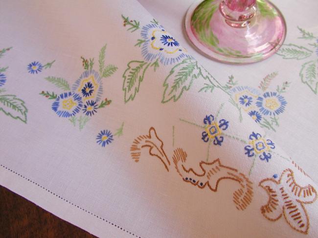 Really beautiful tablecloth with hand-embroidered blue flowers