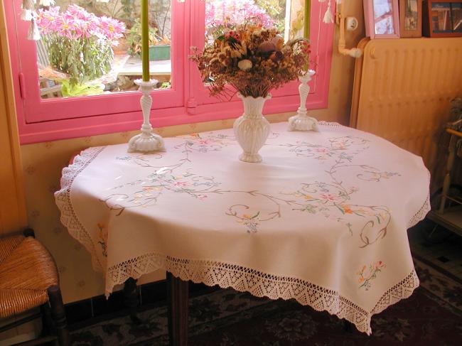 Really breathtaking tablecloth with hand-embroidered flowers and lace edging