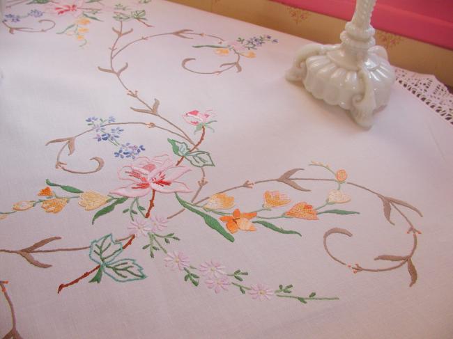 Really breathtaking tablecloth with hand-embroidered flowers and lace edging