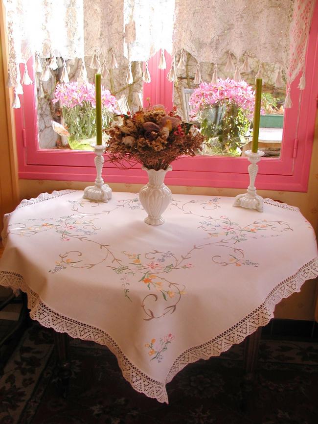 Really breathtaking tablecloth with hand-embroidered flowers and lace edging