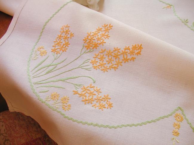 Really stunning tablecloth with hand-embroidered yellow hyacinth