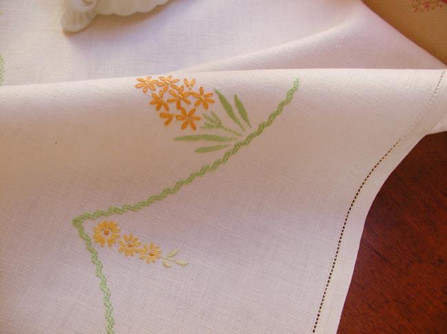 Really stunning tablecloth with hand-embroidered yellow hyacinth