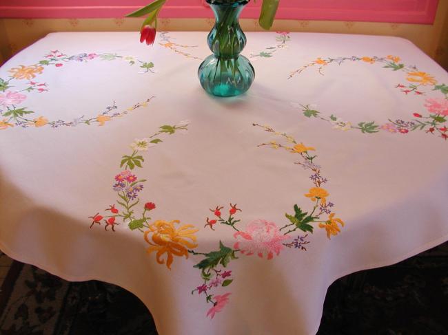 Really breathtaking tablecloth with hand-embroidered roses and wild roses