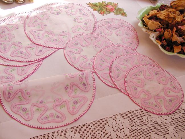 Romantic set of coasters and table mats with hand-embroidery