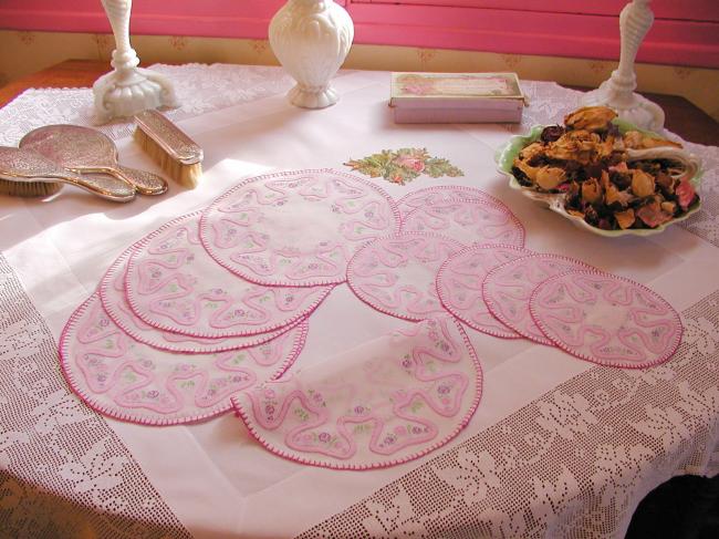 Romantic set of coasters and table mats with hand-embroidery